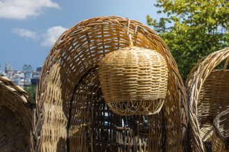 Empty wicker baskets are seein a market place
