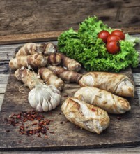 Cooked meat products with spices and tomatoes