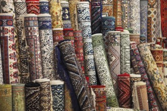Many colorful carpets in the store. Background