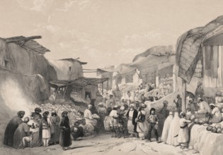Afghans in a marketplace buying and selling fruit, Main street in the bazaar at Kabul, Afghanistan,