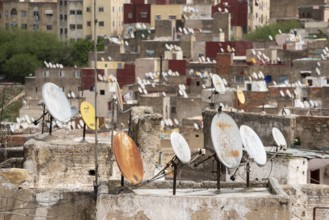 Satellite dishes on the rooftops of residential houses in the medina of Fes, Morocco