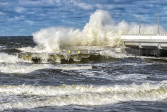 Large braking waves during a storm in Kolobrzeg on the Polish Baltic coast