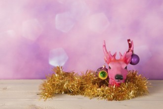 Christmas reindeer with golden ornaments