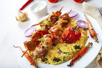 Kebabs with vegetables and bulgur
