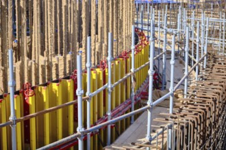 Vertical panel formwork and scaffoldings of reinforced concrete walls under construction.