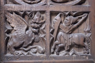 Detail of the choir stalls, fight with a dragon, St, Saint, Saint