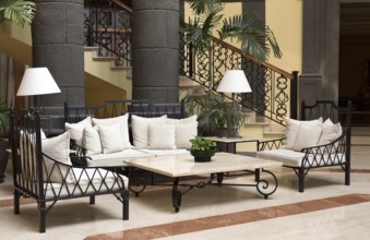 The lobby of the hotel with black columns