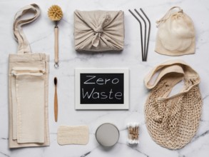 Zero waste concept. Textile wrapping gift, eco bags, metal straws, eco-friendly kitchen tools,