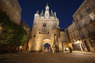 Night view of the Porte Cailhau or Porte du Palais. The former town gate of the city of Bordeaux in