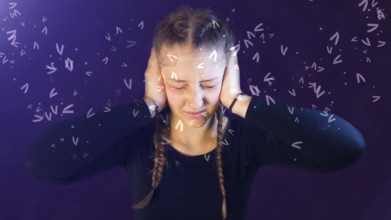 Teenage girl dressed casual with pigtails, being attacked by social media, creating emotional