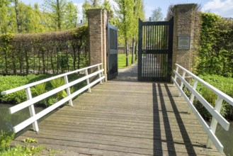 Wide pedestrian bridge over canal