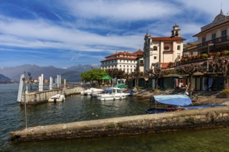 View of the landing stage with Palazzo Boromeo, Borromean Island Isola Bella in Lake Maggiore,