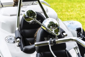 Mondsee, Austria, August 5, 2017: Vintage motorbike on green park in a Motorcycles Fair