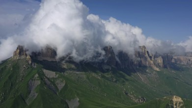 Aerial view on Caucasus mountains under epic clouds, Kabardino-Balkaria, Russia