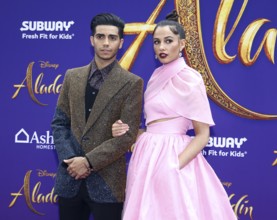 Mena Massoud and Naomi Scott at the Los Angeles premiere of 'Aladdin' held at the El Capitan