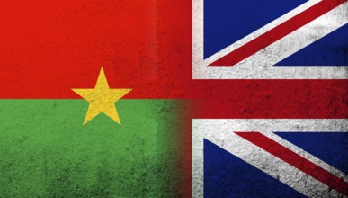 National flag of United Kingdom (Great Britain) Union Jack with National flag of Burkina Faso.