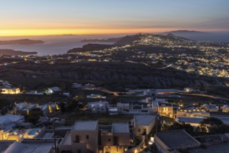 Evening mood after sunset, view from Pyrgos to Fira, Archipelago of Santorini, Cyclades, Greece