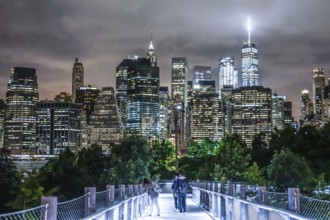 Night view and the people of New York Manhattan. Shooting Location: New York, Manhattan