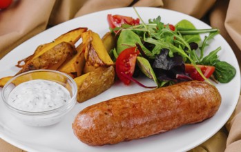 Food, Roasted sausages with baked potatoes and green salad and chicken with cheese