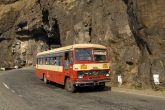 Road and Tunnel constructed by cutting very hard black rock of Sahyadri mountain and State