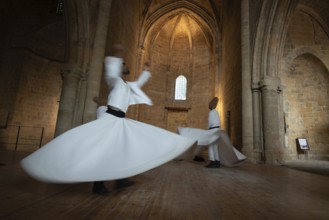 Nicosia, Cyprus, June 5 2019: Group of Dervishes performing the traditional and religious whirling