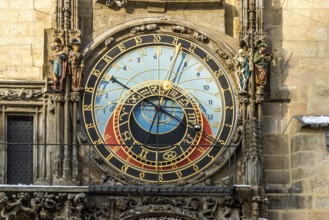 Detail of an astronomical clock with ornate figures and richly decorated details, The Prague Town