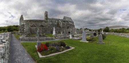Ballyvaughan, Ireland, 28 July, 2022: panorama view of the historic 13th-century Corcomroe Abbey