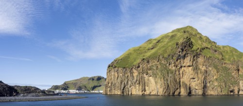 Harbour entrance to the harbour town of Heimaey, steep rocky cliffs, panoramic view, Westman