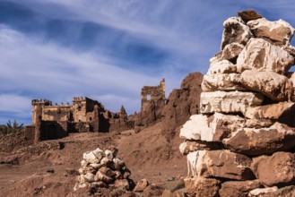 An old kasbah that served as a base for nomadic tribes, with a sense of ruggedness and adventure
