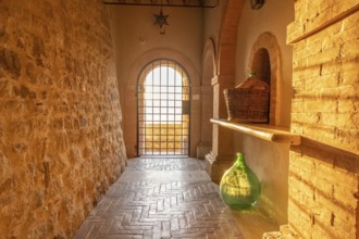 Beautiful sun light inside of an ancient castle near Montalcino, Tuscany, Italy. Old stone medieval