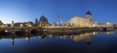 Panorama of Berlin Cathedral, the famous television tower and the rebuilt City Palace at night