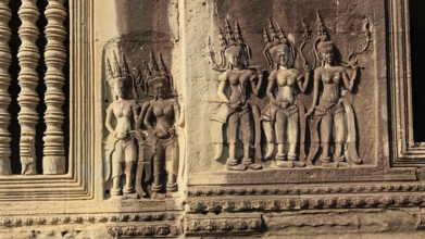 Apsaras half-human, half-divine woman of Hinduism and Buddhism at Angkor Wat in Cambodia