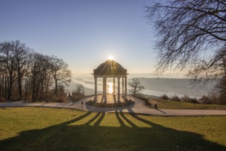 Beautiful temple in a landscape shot. Sunrise on a winter morning. Beautiful view along the Rhine