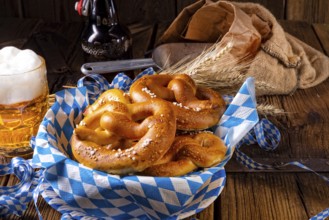 Real homemade bavarian salty pretzel with beer