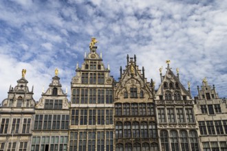The photo shows an image of a historic house front in Antwerp