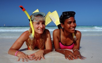 Snorkellers on the beach, Punta Cana, Caribbean, Dominican Republic