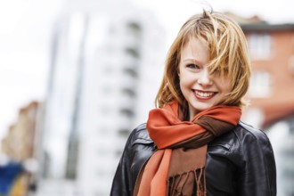 Street portrait of young beautiful fashionable woman. Street fashion concept