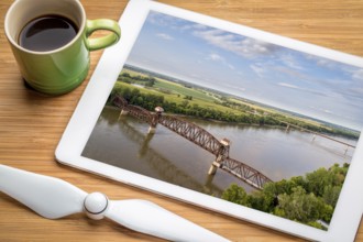 Historic railroad Katy Bridge over Missouri River at Boonville - reviewing aerial image on a