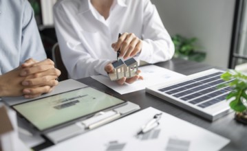 Solar panels green energy Business man working green eco friendly office business creative idea
