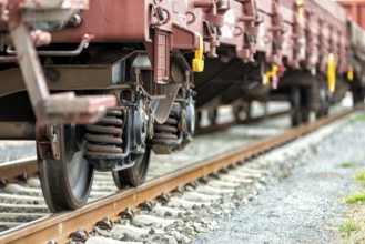 Goods train with goods wagons at a marshalling yard in Europe