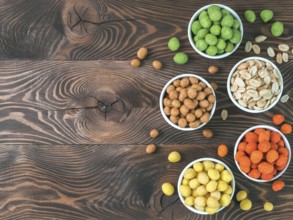 Assortment of different peanuts snack for beer, wine, party bar. Salted peanuts, peanuts in coconut