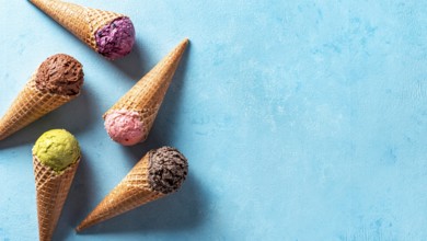 Various ice cream scoops in cones with copy space. Colorful ice cream in cones chocolate,