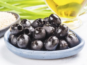 Black olives in blue plate