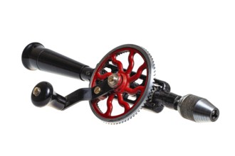 Old hand drill on an isolated background