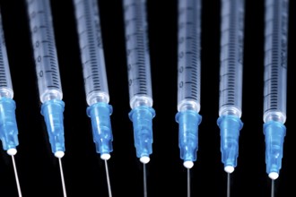 Medical Syringes Needle on Black Background, Close up Syringe
