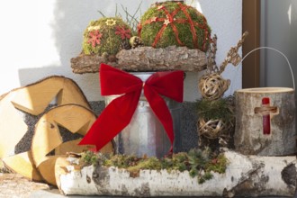 Christmas exterior decoration next to the house entrance