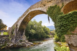 Cangas de Onis roman bridge on Sella river in Asturias of Spain