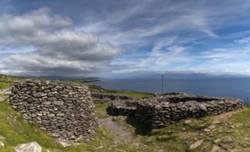 Fahan, Ireland, 5 August, 2022: view of the Fahan beehive huts on the Dingle Peninsula in County