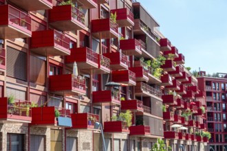 Red modern apartment block in Berlin, Germany