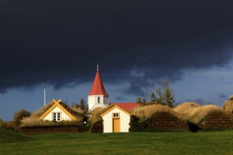 Iceland, Glaumbaer church and village view, Glaumbaer, Iceland